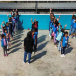 Niños migrantes se gradúan de primera escuela en albergue en la frontera norte de México